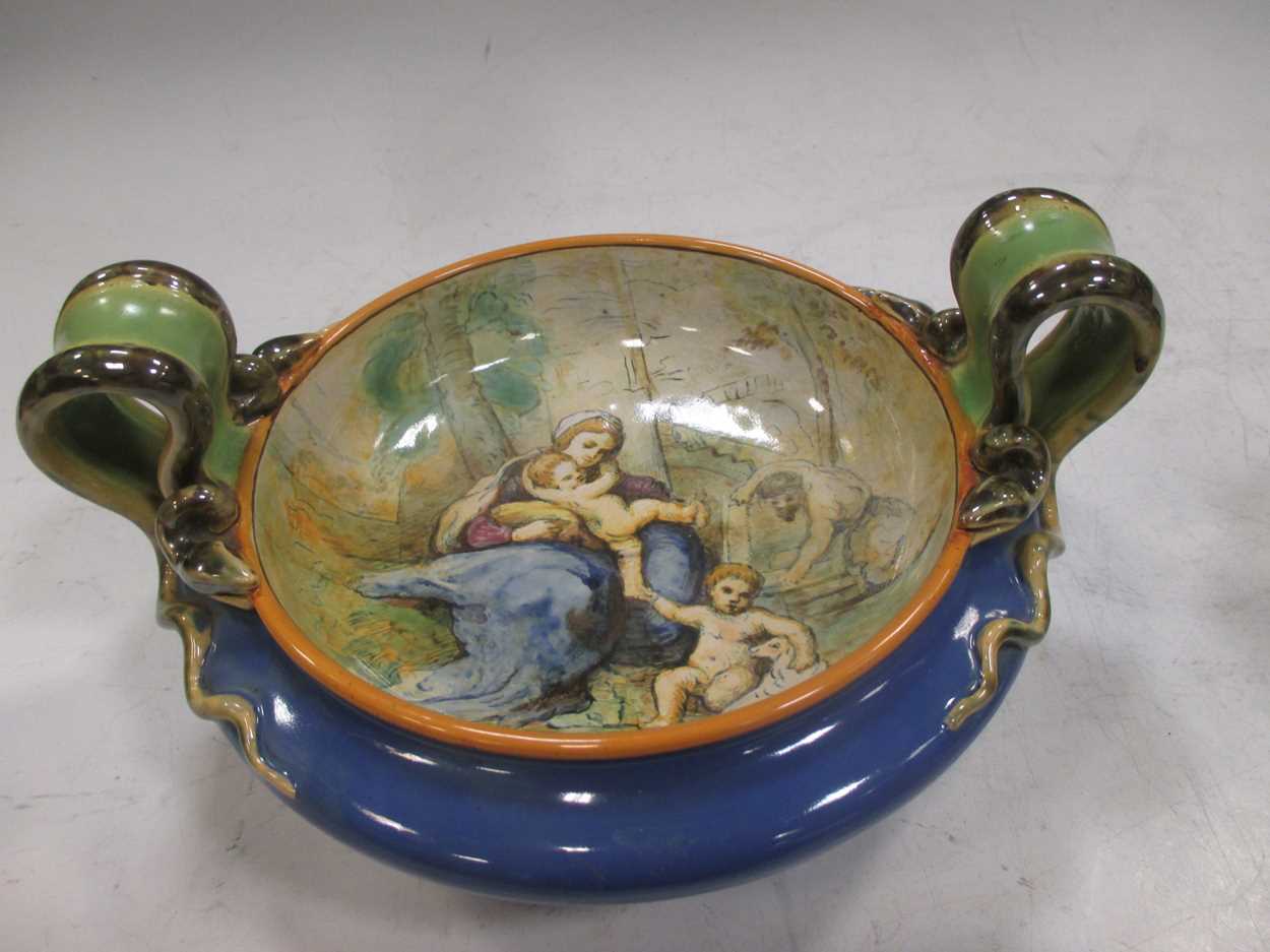A Majolica style two handled bowl, decorated with a mother and her children, the handles modelled as - Image 9 of 15
