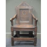 A mid 17th century style Wainscot armchair,