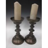 A pair of brass pricket-candlesticks of 16th Century style,