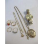 A collection of jewellery including a 9ct gold locket, a chain tested as 9ct gold and a 9ct gold