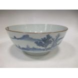 A Chinese blue and white landscape painted punch bowl, (rim chip)