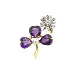 A diamond cluster ring together with an amethyst brooch,