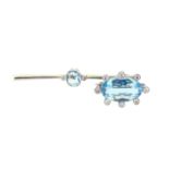 Two aquamarine and diamond set brooches,