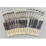 An 18 piece set of George V silver flatware with 18 additions,