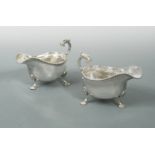 A pair of George V silver oversized sauceboats,