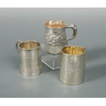 A trio of Victorian silver children's mugs,
