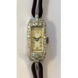Unsigned - A lady's diamond set cocktail watch,