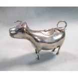 A (probably) Dutch metalwares silver Schuppe style cow creamer,