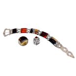 An agate bracelet and two brooches in the Scottish style,