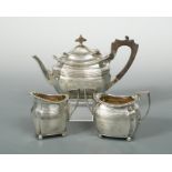 An Edward VII silver three piece bachelor's tea set,