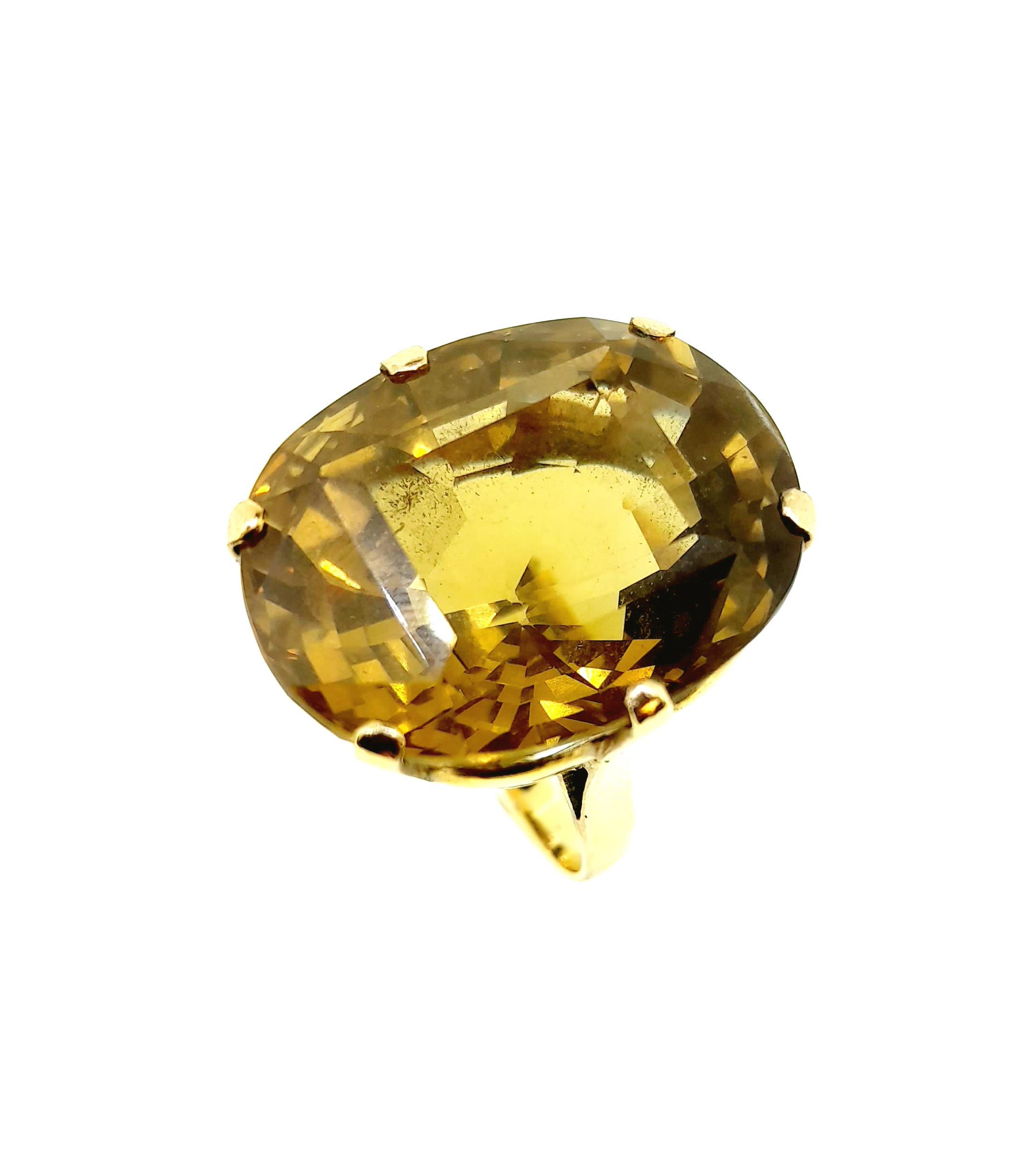 A large single stone citrine dress ring,