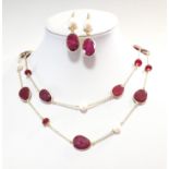 A modern ruby and freshwater pearl necklace and ear pendant suite,