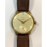 Zenith - A gentleman's 9ct gold wristwatch retailed by Tarratt,