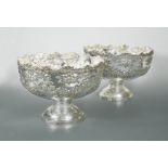 A pair of large and modern silver plated rose bowls,