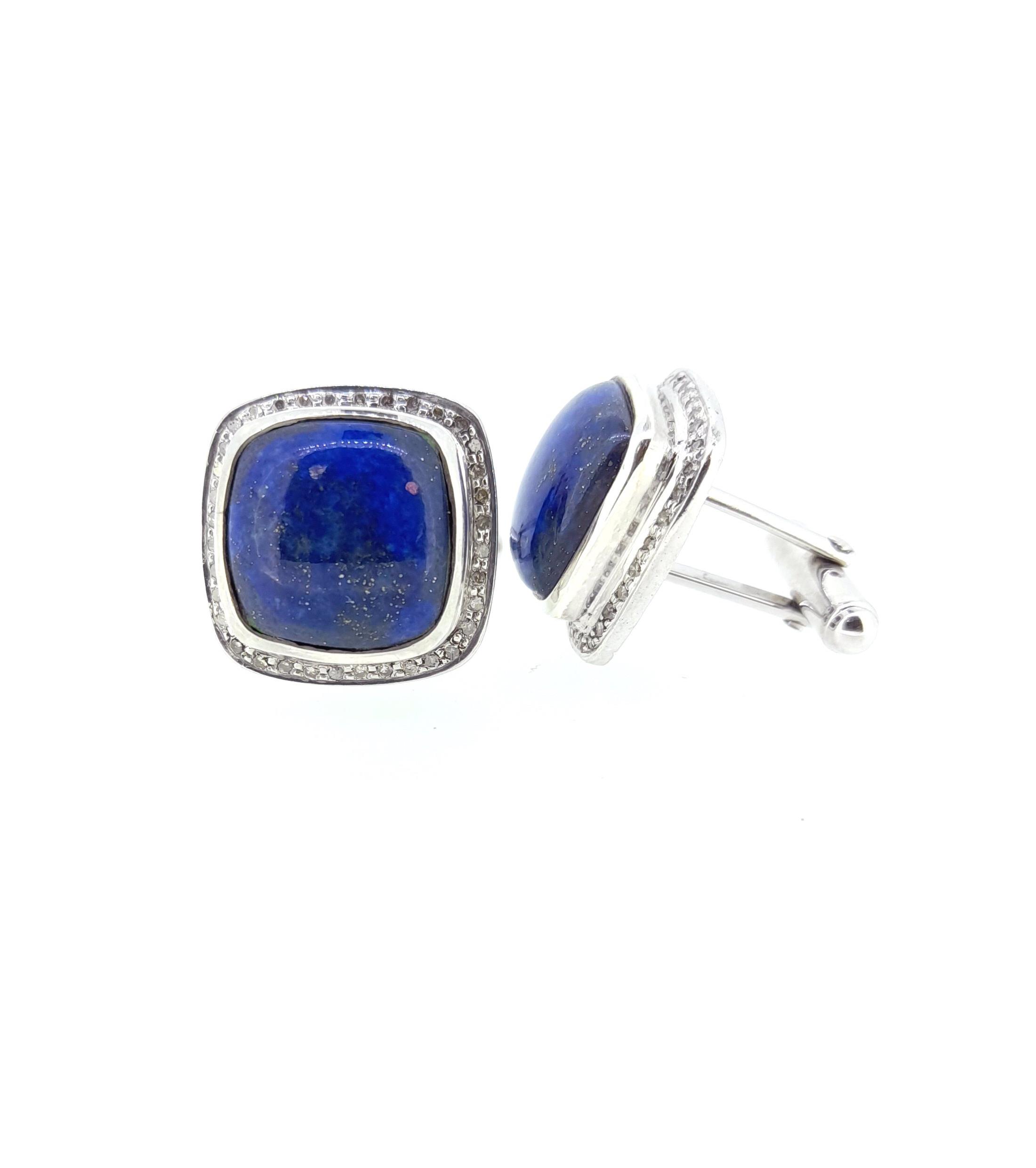 A pair of lapis lazuli and diamond cufflinks,