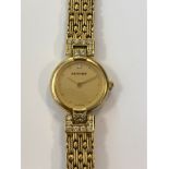 Bueche Girod - A lady's 9ct gold and diamond set wristwatch,