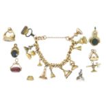 A late 19th Century charm bracelet,