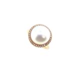 A pearl and diamond cocktail ring,