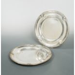 A pair of 20th century French metalwares silver platters,