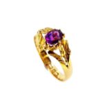 A Victorian 18ct gold and purple sapphire ring,