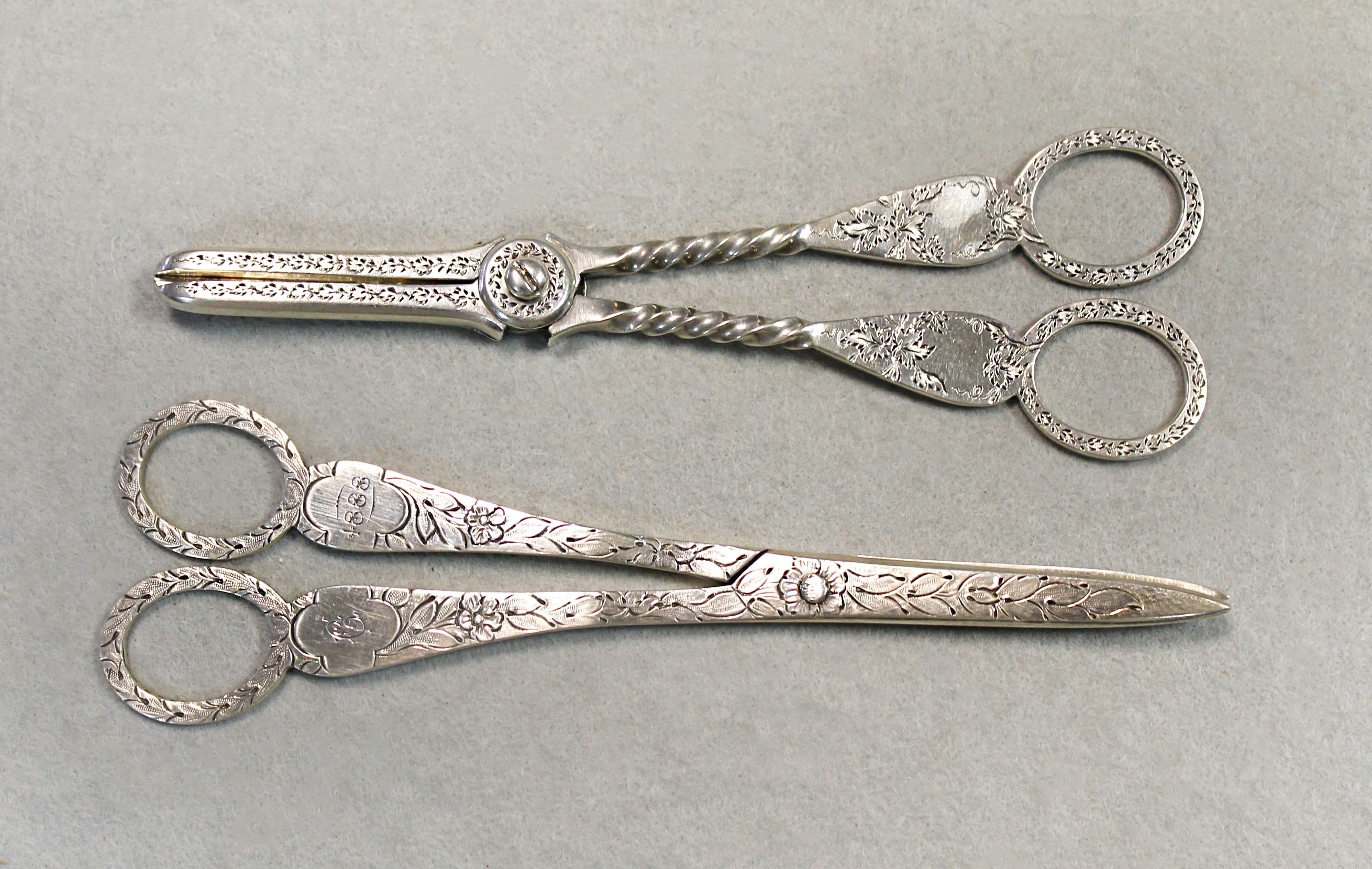 Two pairs of Victorian silver grape scissors,