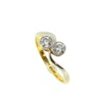 A two stone diamond crossover style ring,