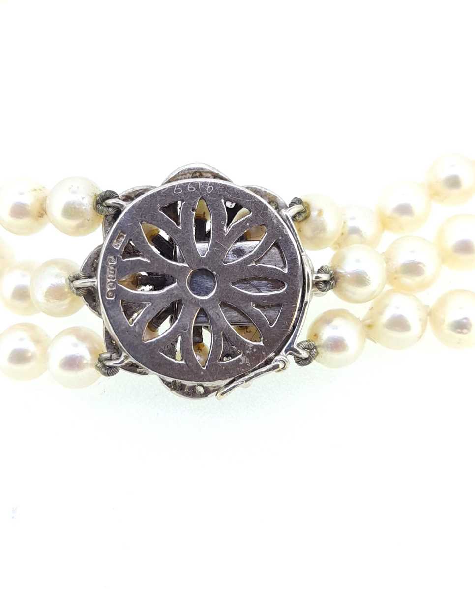 A three row pearl collar with a diamond set clasp, - Image 3 of 3