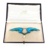 Child & Child - An Art Nouveau pearl and enamel wings brooch,