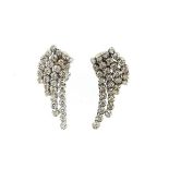 A pair of diamond cascade earrings,