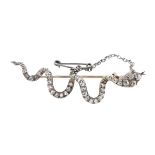 A Victorian diamond set serpent brooch,