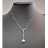 A pearl and diamond negligée style pendant necklace,