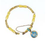 A decorative turquoise and enamel memorial bracelet,