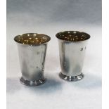 A pair of 20th century silver beakers,