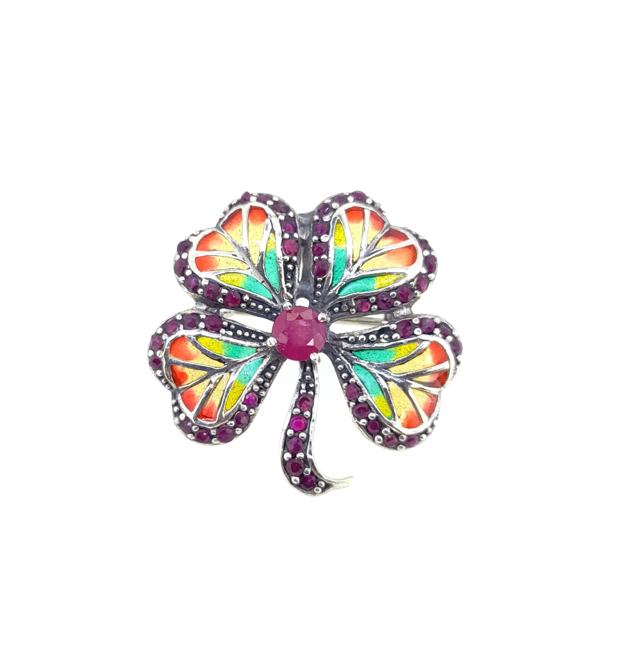 A plique-à-jour enamel four leaf clover pendant/brooch,