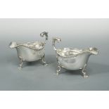 A pair of oversized Victorian silver sauceboats,