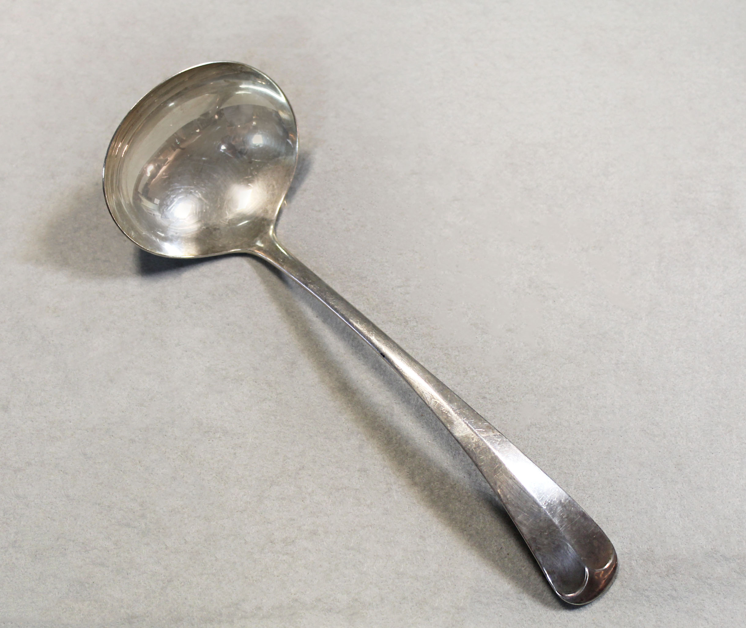 A 20th century silver soup ladle,