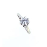 A diamond solitaire ring,