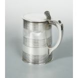 A George III 18th century silver lidded beer mug,