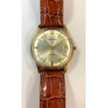 Garrard - A gentleman's 9ct gold wristwatch,