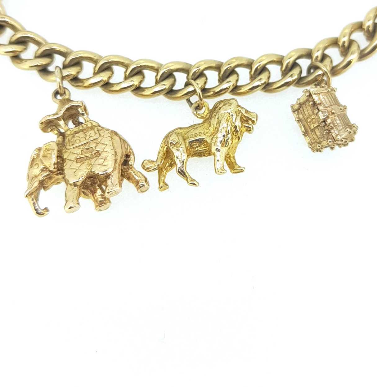 A 9ct gold charm bracelet with many hallmarked charms, - Image 3 of 4