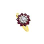 A late 20th century ruby and diamond cluster ring,