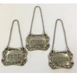 A trio of Edward VII silver decanter labels,