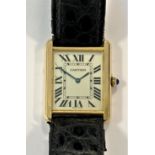 Cartier - A Swiss 18ct gold and stainless steel 'Tank Solo' wristwatch,