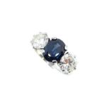 A sapphire and diamond three stone ring,