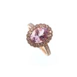 A morganite and diamond cluster ring,