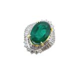 An impressive emerald and diamond cocktail ring,