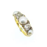 A Victorian pearl and diamond carved head half hoop ring,