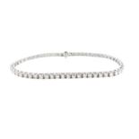 An 18ct white gold diamond line bracelet,