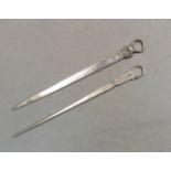 Two George III 18th century silver meat skewers,