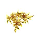 Cropp & Farr - An 18ct gold floral brooch,
